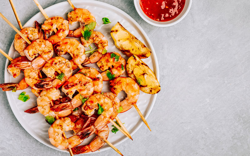 shrimp skewers at an open house